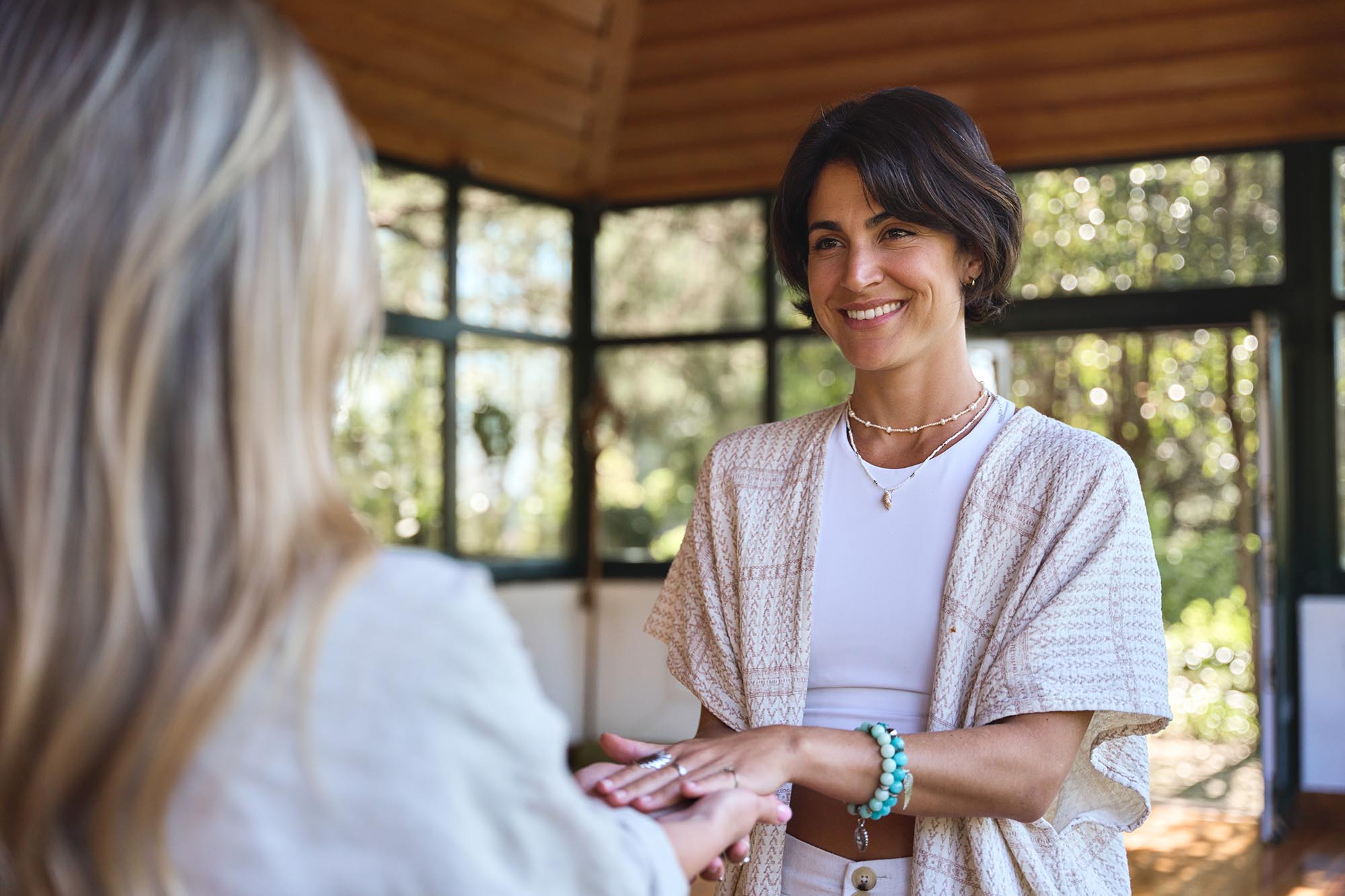 Life coach offering support in a conversation with a client