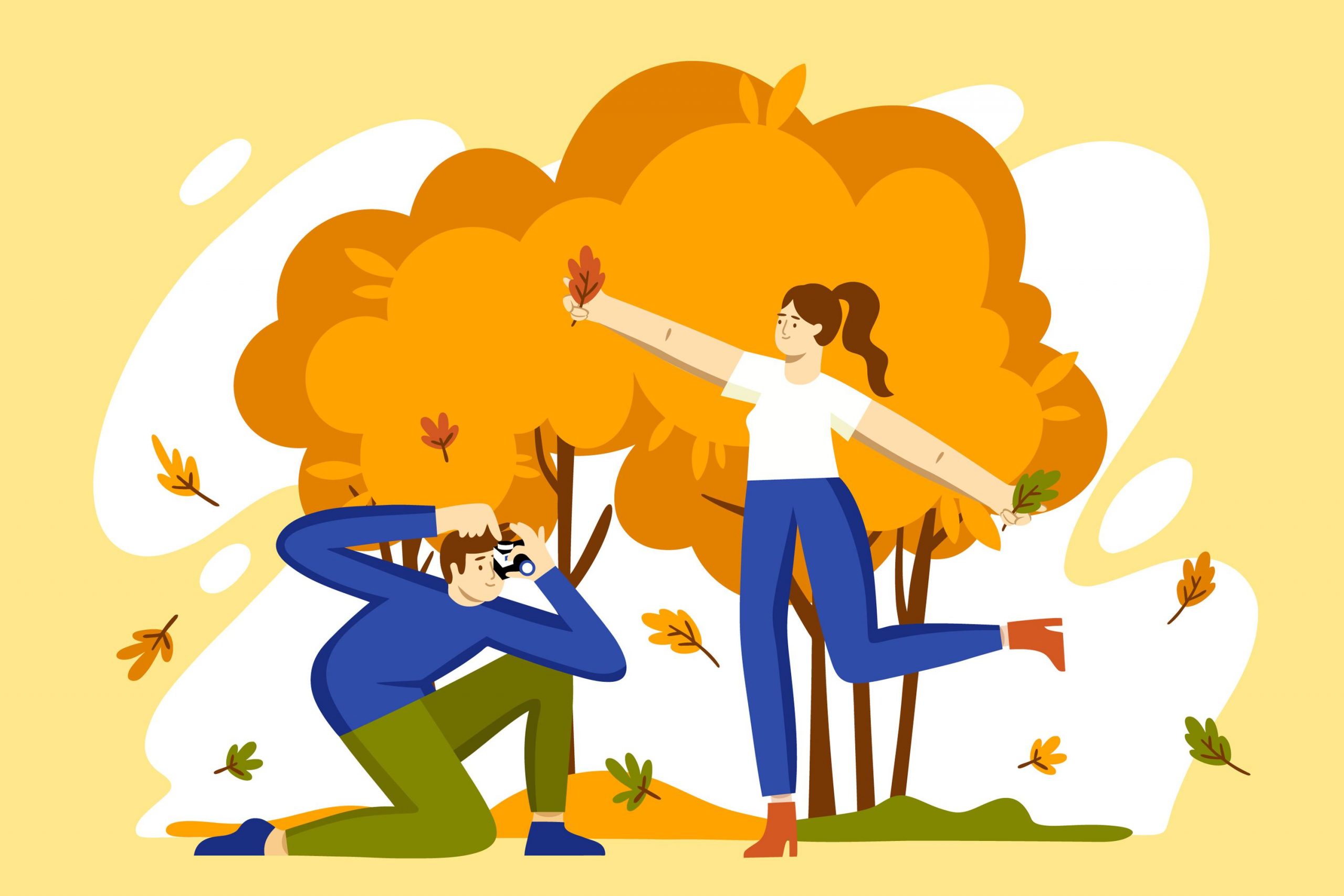 person taking a photo of another person enjoying nature in an autumn setting, representing the value of joy, creativity, and balance in career goals.